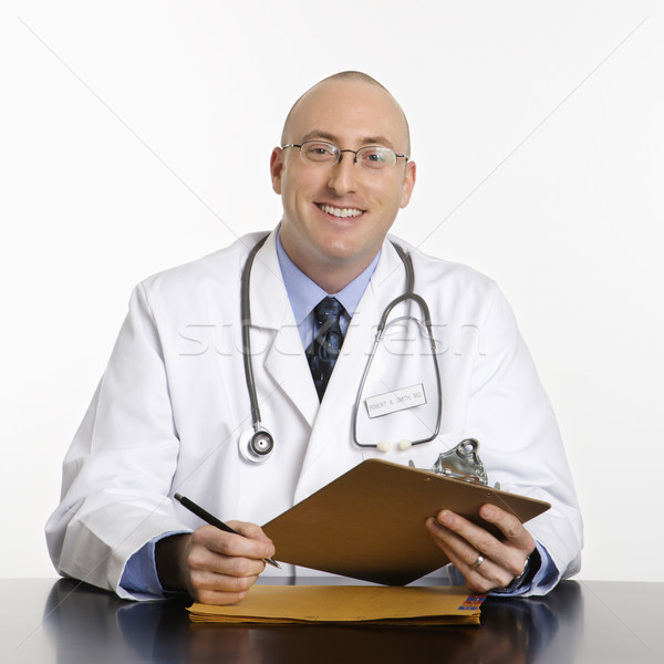 Männlich Arzt Erwachsenen Arzt Sitzung Stock foto © iofoto