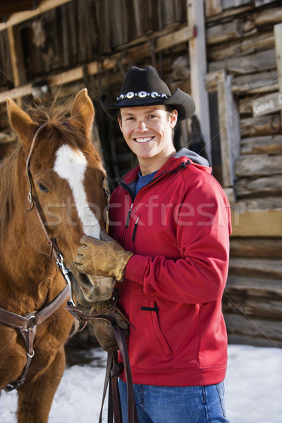 Man petting horse. Stock photo © iofoto