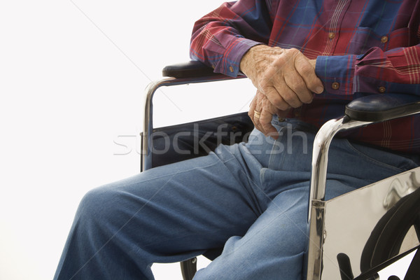 Elderly man in wheelchair. Stock photo © iofoto