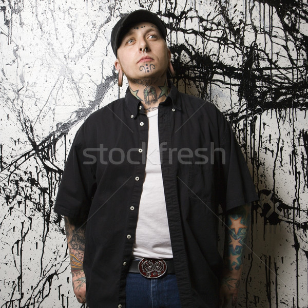 Wytatuowany człowiek stałego farby mężczyzn portret Zdjęcia stock © iofoto