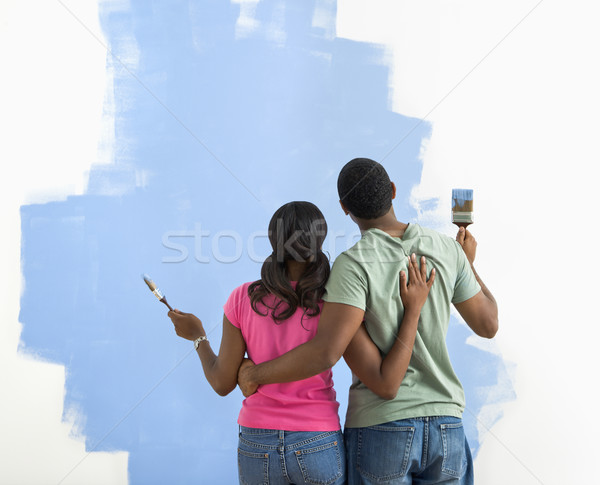 Man and woman looking at paint job. Stock photo © iofoto