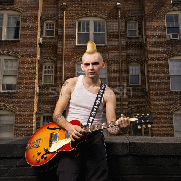 Punk jogar guitarra retrato caucasiano masculino Foto stock © iofoto