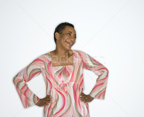 Woman with hands on hip. Stock photo © iofoto