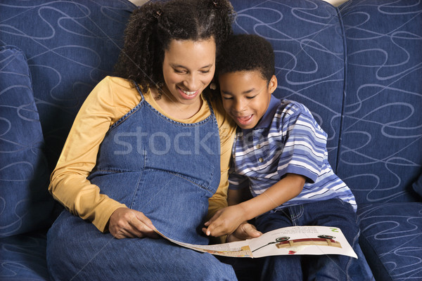 Femme lecture livre fils adulte séance [[stock_photo]] © iofoto