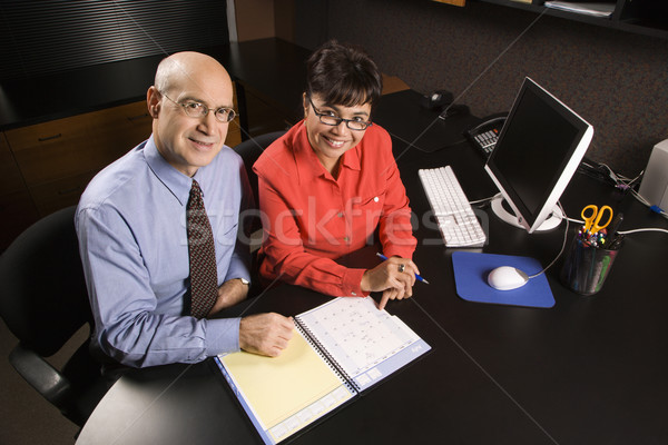 Geschäftsleute Büro Geschäftsmann Geschäftsfrau lächelnd Ernennung Stock foto © iofoto
