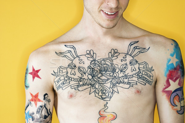 A torso nudo tatuato maschio petto Foto d'archivio © iofoto