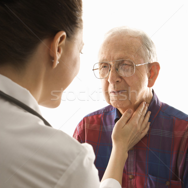 Doctor checking pulse. Stock photo © iofoto