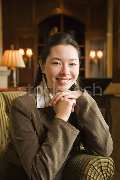 Businesswoman smiling. Stock photo © iofoto