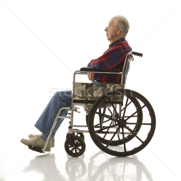 Stock photo: Elderly man in wheelchair.