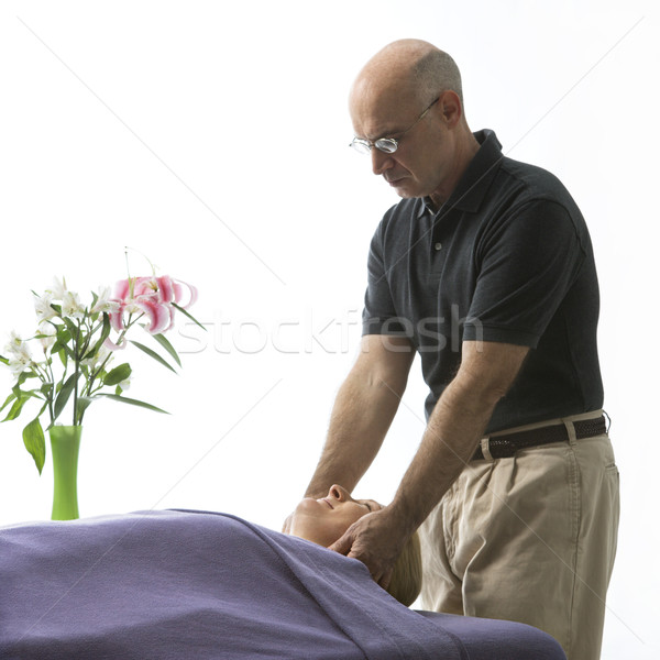 Man massaging woman. Stock photo © iofoto