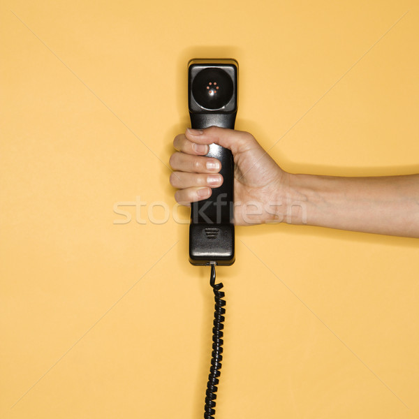 Kéz tart telefon közelkép nő telefonkagyló Stock fotó © iofoto
