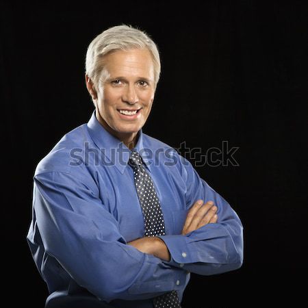 Smiling businessman. Stock photo © iofoto