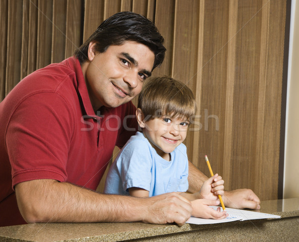 Papà figlio compiti per casa ispanico figlio di padre sorridere Foto d'archivio © iofoto