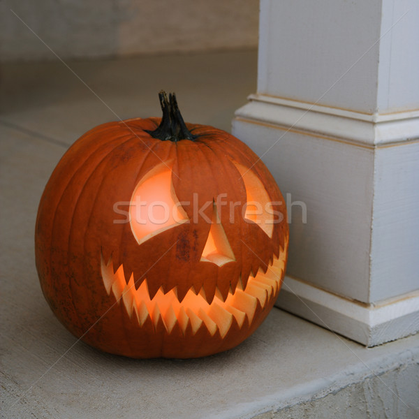 Glowing jack-o'-lantern. Stock photo © iofoto