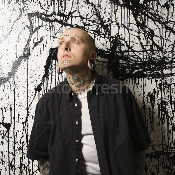 Tatuato uomo piedi vernice uomini punk Foto d'archivio © iofoto