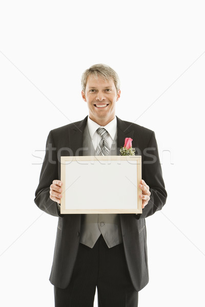 Stock photo: Groom in tuxedo.