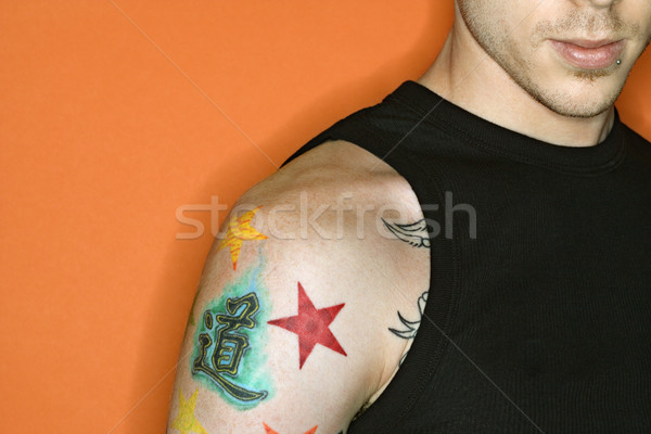 Man with tattoos. Stock photo © iofoto