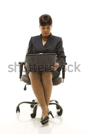 Businesswoman with laptop. Stock photo © iofoto