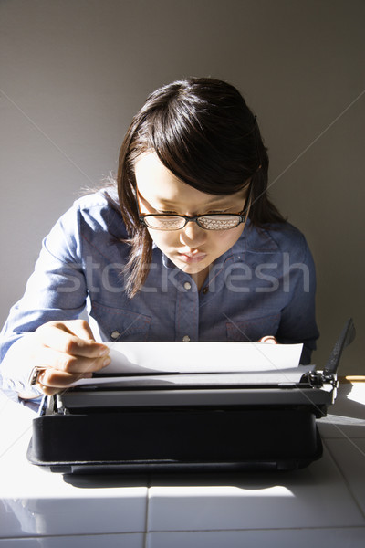 Woman with typewriter. Stock photo © iofoto