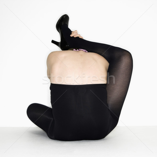 Woman attempting stretch, Stock photo © iofoto