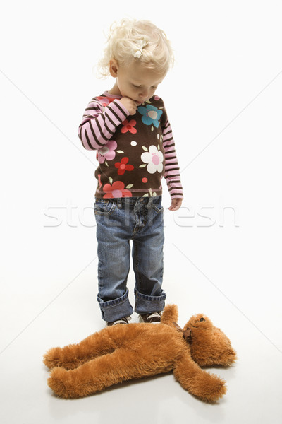 Girl with stuffed toy. Stock photo © iofoto