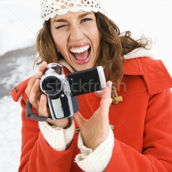 Vrouw videocamera kaukasisch vrouwelijke winter Stockfoto © iofoto