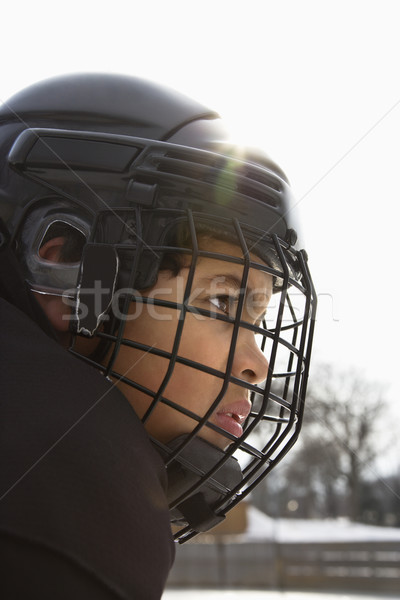 Hokej gracz chłopca klatki kask Zdjęcia stock © iofoto