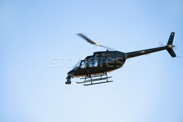 Zwarte helikopter vliegen lucht shot Stockfoto © iofoto