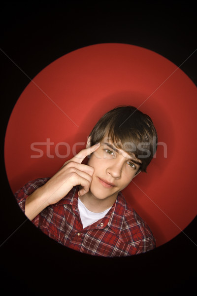 Boy pointing to head. Stock photo © iofoto