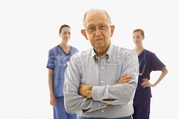 Man with healthcare workers. Stock photo © iofoto