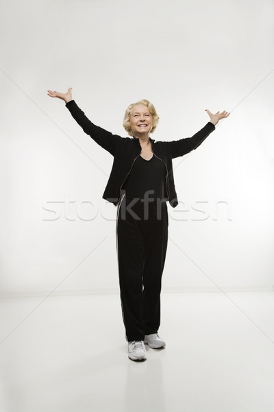 Woman with open arms. Stock photo © iofoto