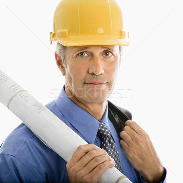 Businessman in hard hat. Stock photo © iofoto