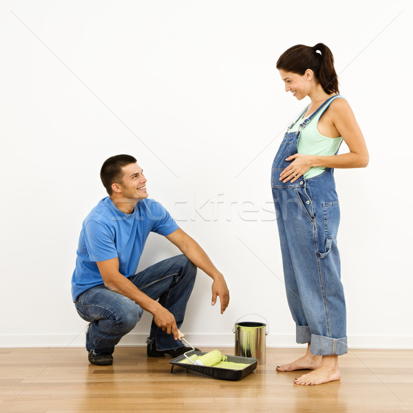 Paar baby zwangere vrouw echtgenoot verf interieur Stockfoto © iofoto
