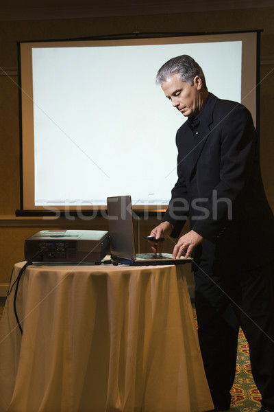 бизнесмен презентация взрослый кавказский компьютер человека Сток-фото © iofoto