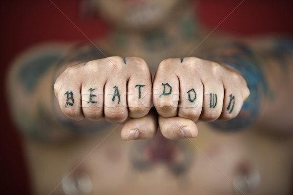 Ellenséges tetoválás kezek kaukázusi férfi tetoválások Stock fotó © iofoto