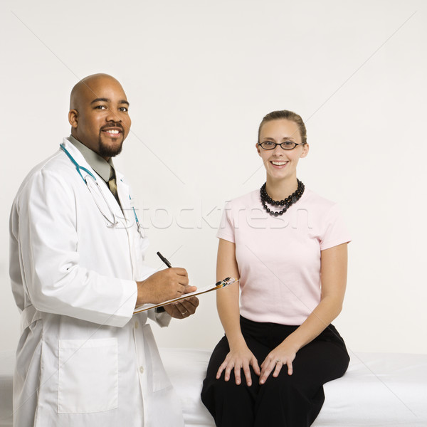 Doctor with patient. Stock photo © iofoto