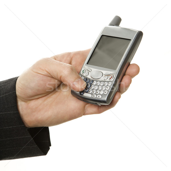 Businessman using PDA. Stock photo © iofoto