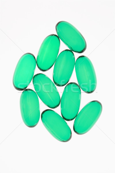 Green vitamin caplets Stock photo © iofoto