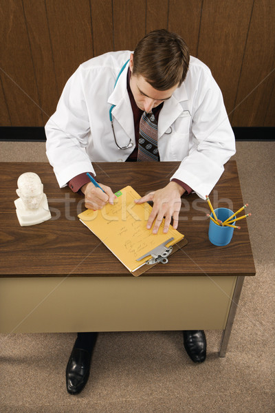 Stock photo: Doctor with files.