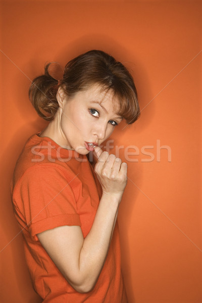 Frau Daumen gestikulieren orange Farbe Stock foto © iofoto