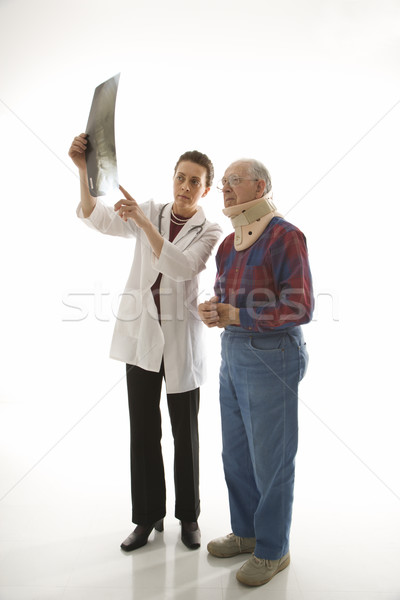 Doctor and injured patient. Stock photo © iofoto