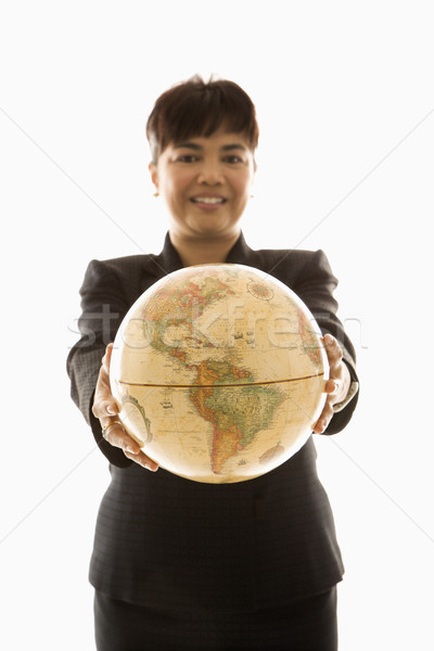 Businesswoman holding globe. Stock photo © iofoto