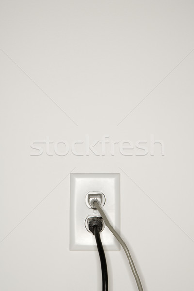 Wall outlet with plugs. Stock photo © iofoto