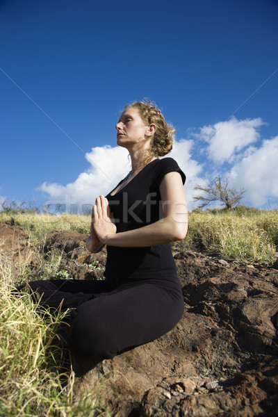 Woman doing yoga. Stock photo © iofoto