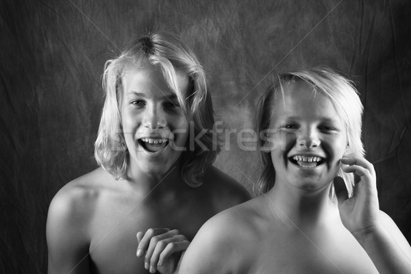 Two young brothers laughing. Stock photo © iofoto
