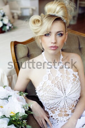 beauty young bride alone in luxury vintage interior with flowers Stock photo © iordani