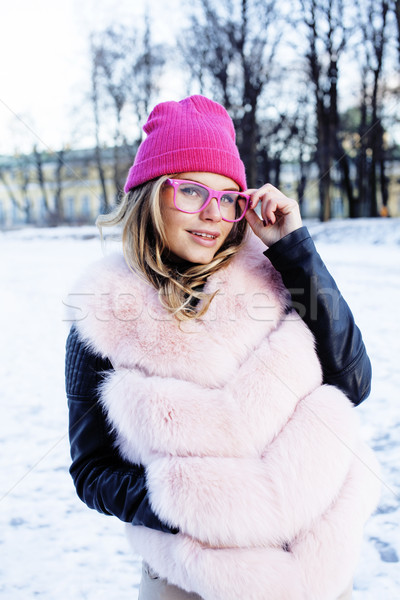 young pretty teenage hipster girl outdoor in winter snow park having fun drinking coffee, warming up Stock photo © iordani