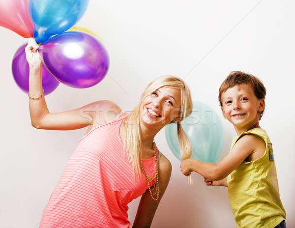 pretty real family with color balloons on white background, blon Stock photo © iordani