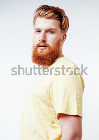 young handsome hipster ginger bearded guy looking brutal isolated on white background, lifestyle peo Stock photo © iordani
