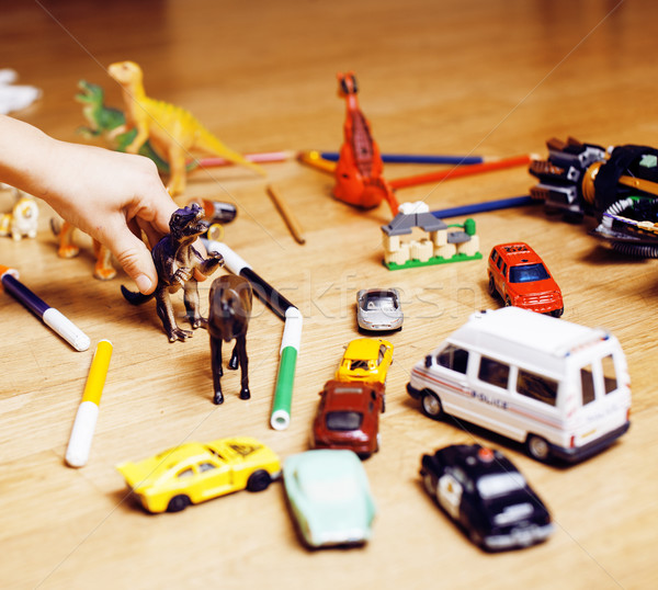 children playing toys on floor at home, little hand in mess, free education Stock photo © iordani